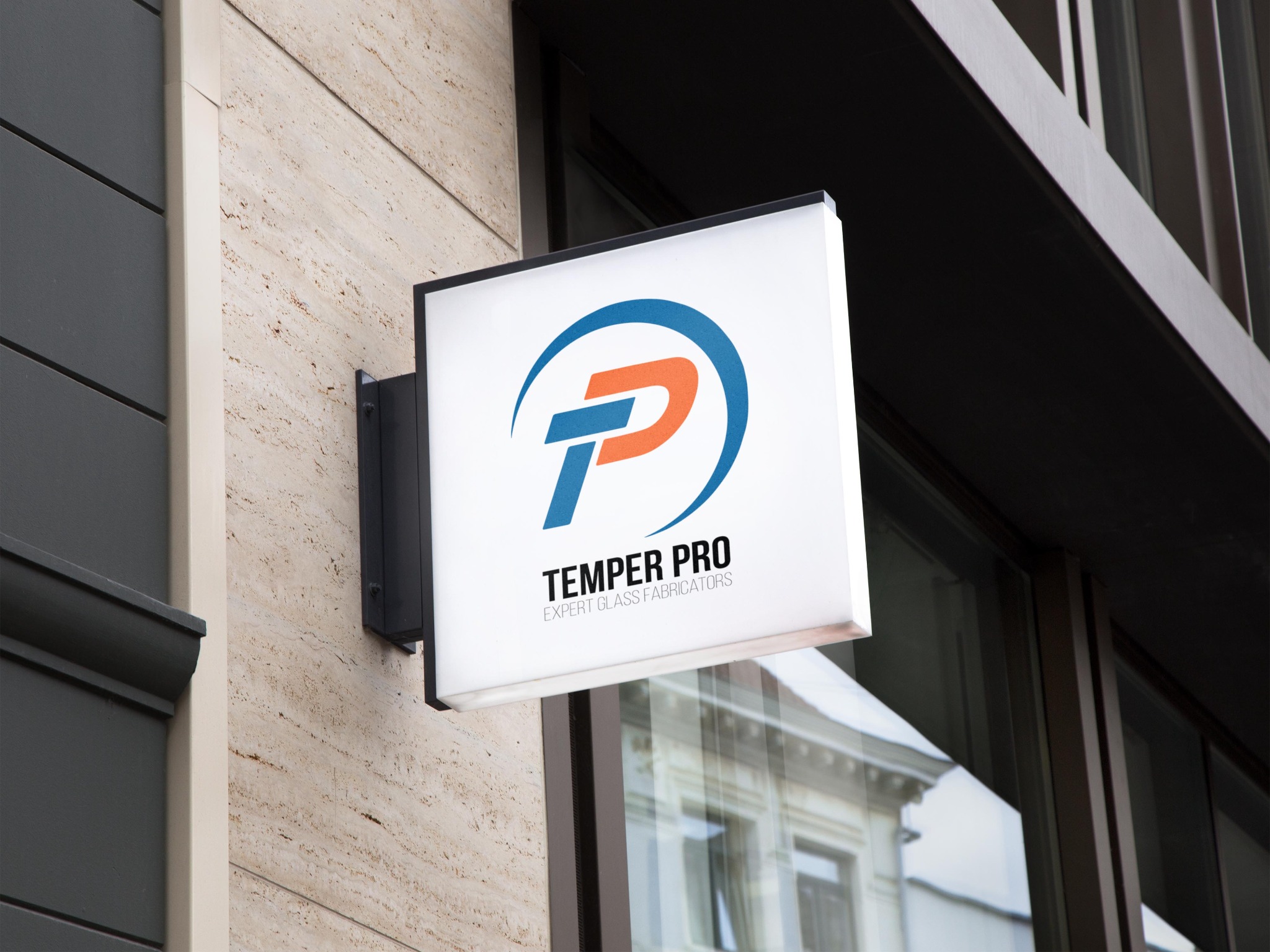 Temper Pro logo displayed on a building sign